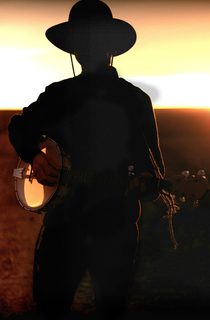 Silhouette of a person wearing a cowboy hat and playing a banjo