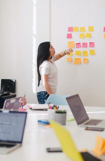 Woman leading a group meeting